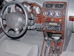 Накладки на торпеду Nissan Xtera 2002-2004 базовый набор, АКПП, 16 элементов.